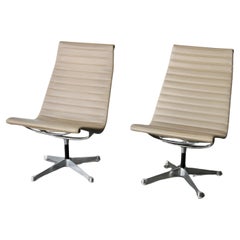 Pair of swiveling 1960s Herman Miller Eames Aluminum Group swivel Lounge Chairs