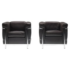 Stunning set of LC2 armchairs in brown leather by Le Corbusier for Cassina.