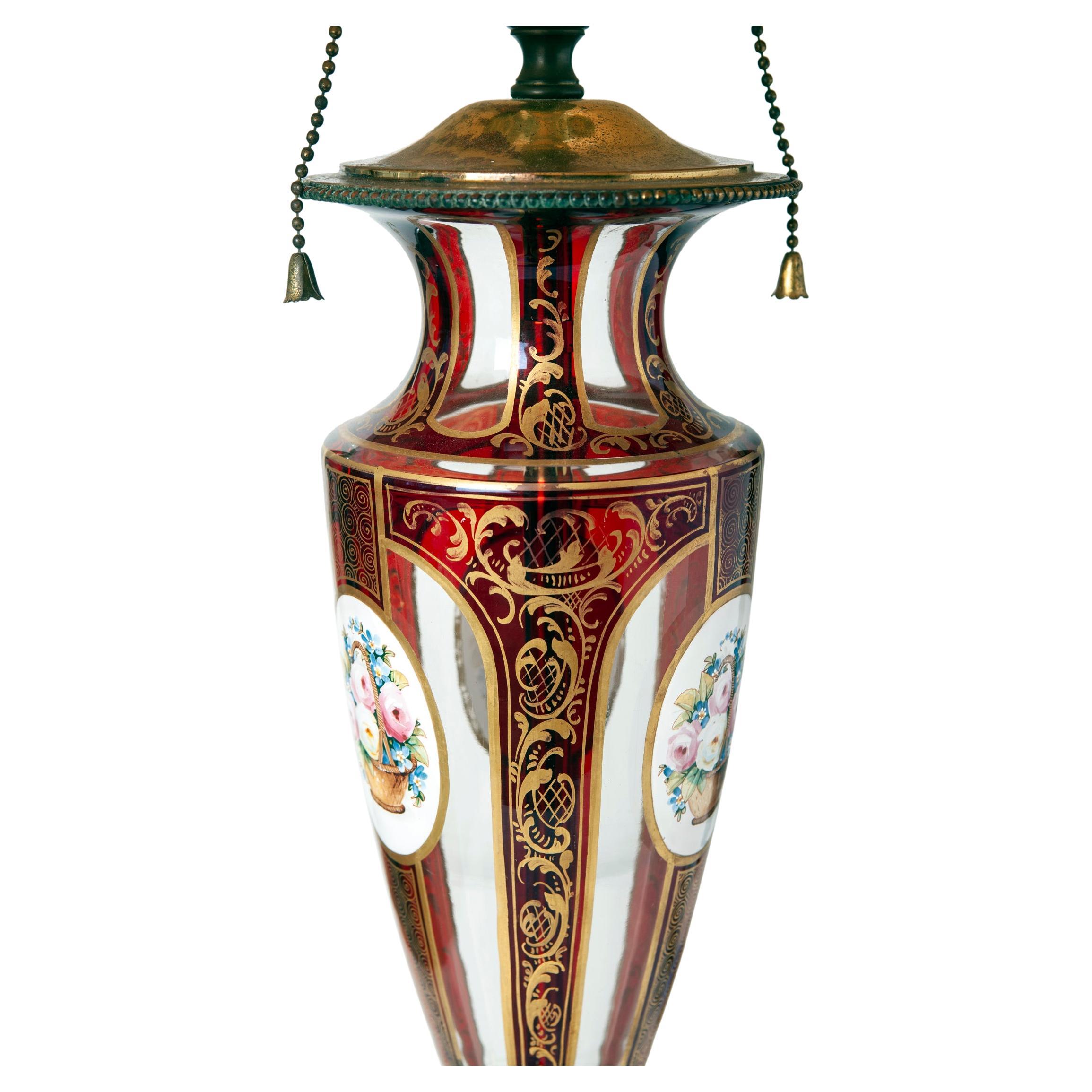 Early 20th century Romanian gilt and hand paint & hand cut ruby Bohemian table lamp. Marble base with brass base.
