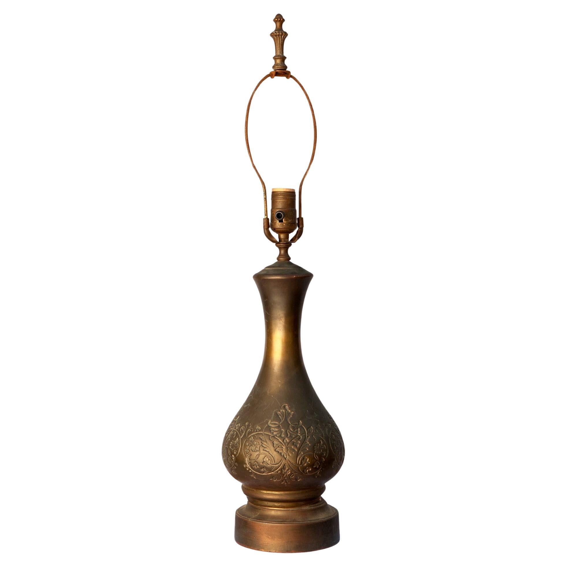 Stunning Indonesian etched brass/bronze vase converted to a lamp & mounted on a modern base. The barrel A-line shade in oatmeal has a stain at the top & is considered 