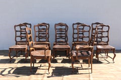 Italienische Esszimmerstühle im Landhausstil aus den 1950er Jahren, aus geschnitztem Holz mit Sitzflächen aus Binsen – 12er-Set