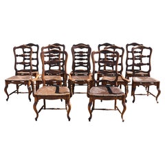 Italienische Esszimmerstühle im Landhausstil aus den 1950er Jahren, aus geschnitztem Holz mit Sitzflächen aus Binsen – 12er-Set