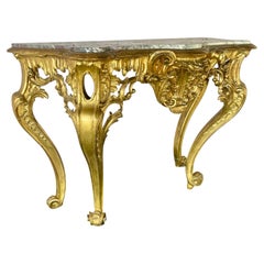 Mesa consola francesa de estilo Luis XV, de madera dorada con tablero de mármol