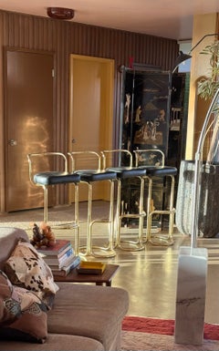 Set of 4 leather and brass bar stools, 1970s