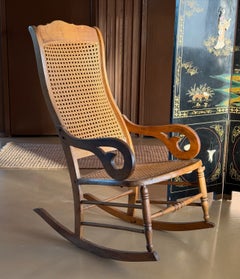 Antique wood and cane Lincoln rocking chair, 19th century
