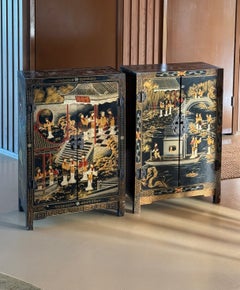 Pair of painted chinoiserie cabinets with iron hardware, 20th century