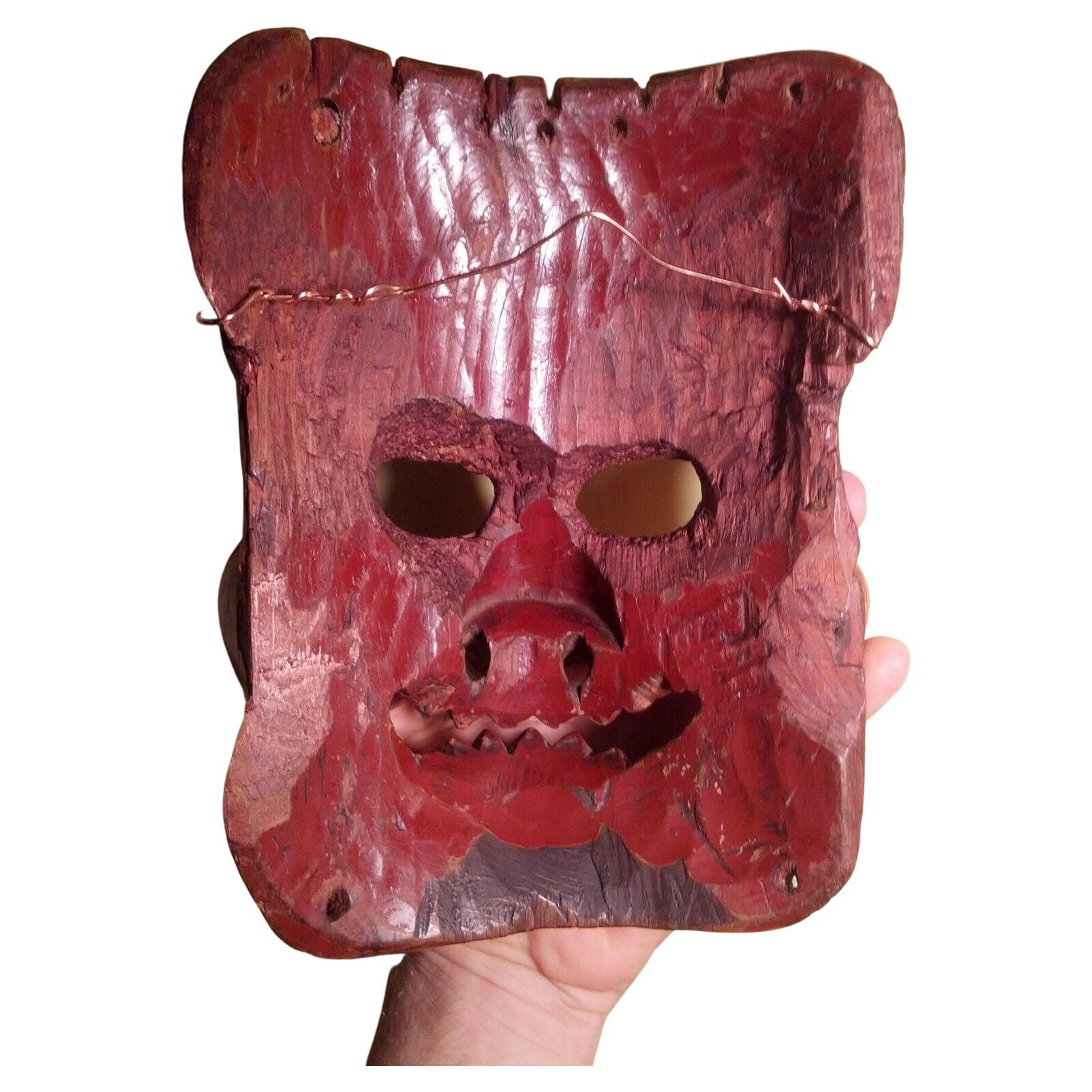 wooden oni mask