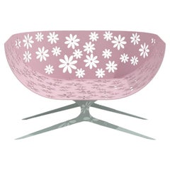 Fauteuil d'extérieur moderne rose et vert à dossier incurvé avec motif floral