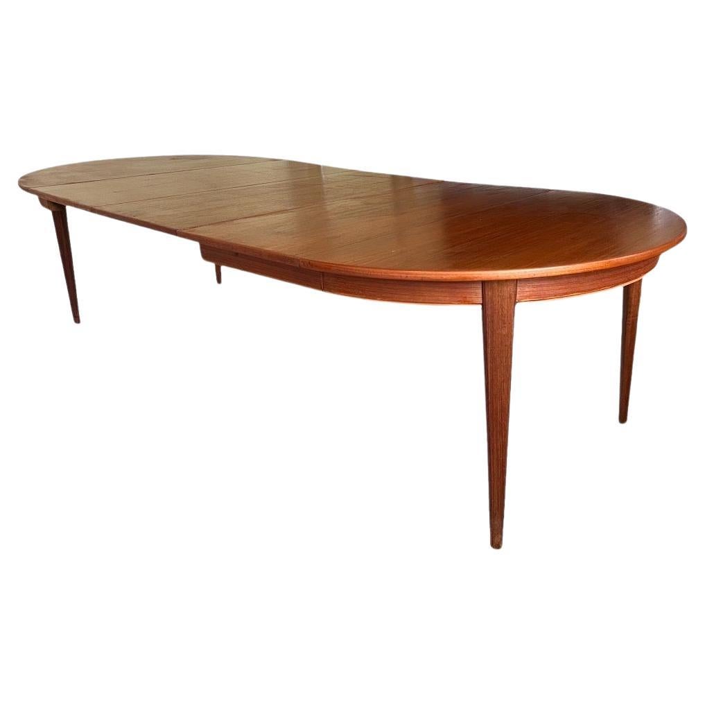 Danish Mid Century Modern Round Dining Table with Extendable Folding