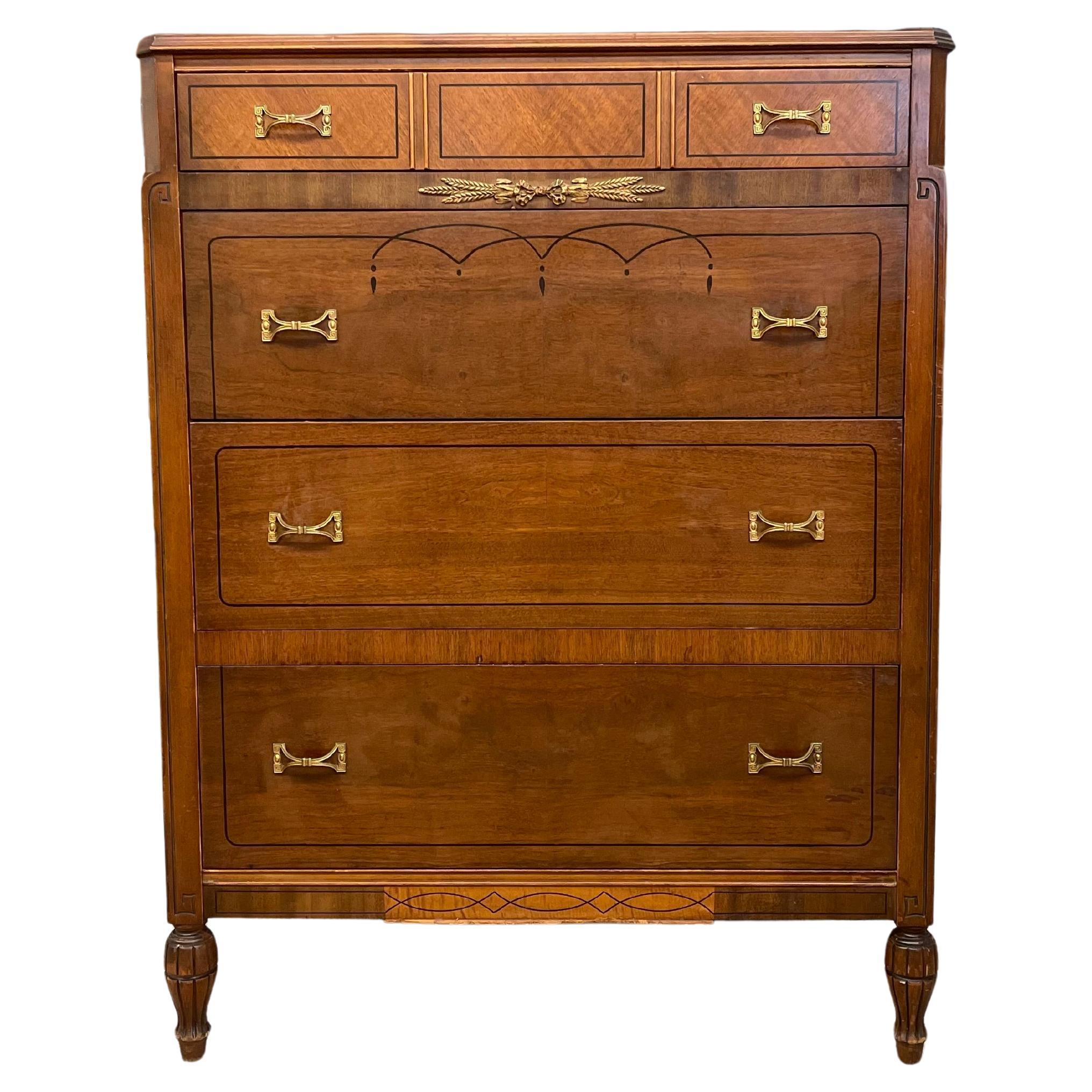 Early 20th Century Neoclassical Style Inlaid Mahogany Tall Chest with Brass Pull For Sale