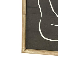 Gerahmtes, minimalistisches, abstraktes Kunstwerk mit weißen Linienfiguren auf schwarzem Hintergrund