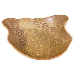 Handmade Studio Pottery Bowl with Organic Curved Form and Textured Impressions.
