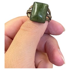 Vintage Green Stone Ring with Ornate Split-Shank Setting.