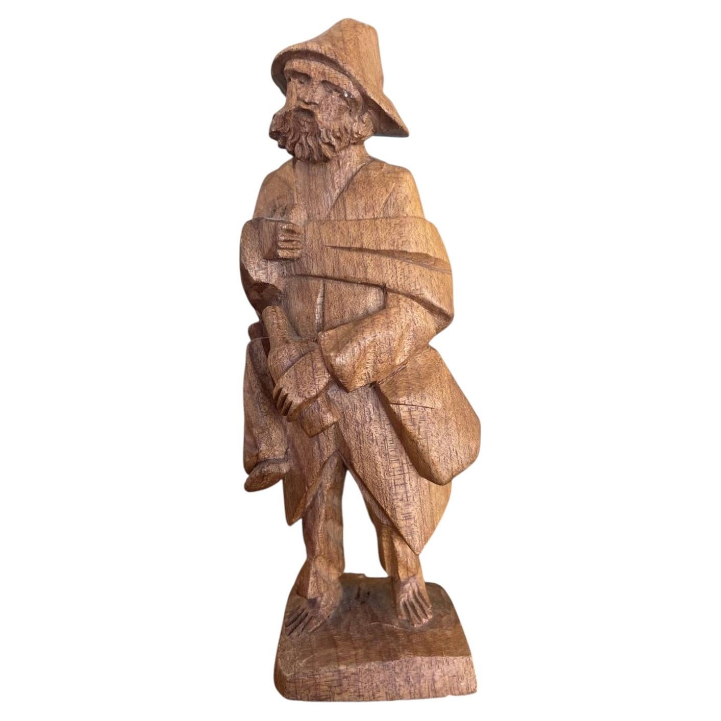 Hand Carved Mid-20th Century Folk Art Wooden Sculpture of Bearded Traveler. For Sale