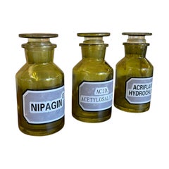 Set of 3 Vintage Olive Green Toned Glass Apothecary Bottles with Glass Stoppers.