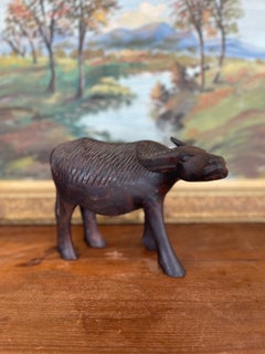 Vintage Hand-Carved Wooden Water Buffalo Sculpture with Textured Detailing.