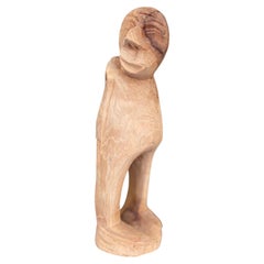 Hand-Carved Mid 20th Century Abstract Wooden Figure Sculpture in Natural Finish.