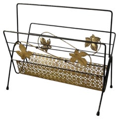 Mid-Century Modern Black Wrought Iron and Brass Toned Magazine Rack.