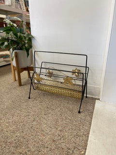 Mid-Century Modern Black Wrought Iron and Brass Toned Magazine Rack.