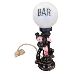 Whimsical Mid-Century Novelty Bar Lamp with Ceramic Drunk Man and Frosted Globe
