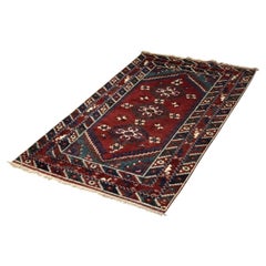 Tapis afghan oriental rouge tissé à la main, années 1970