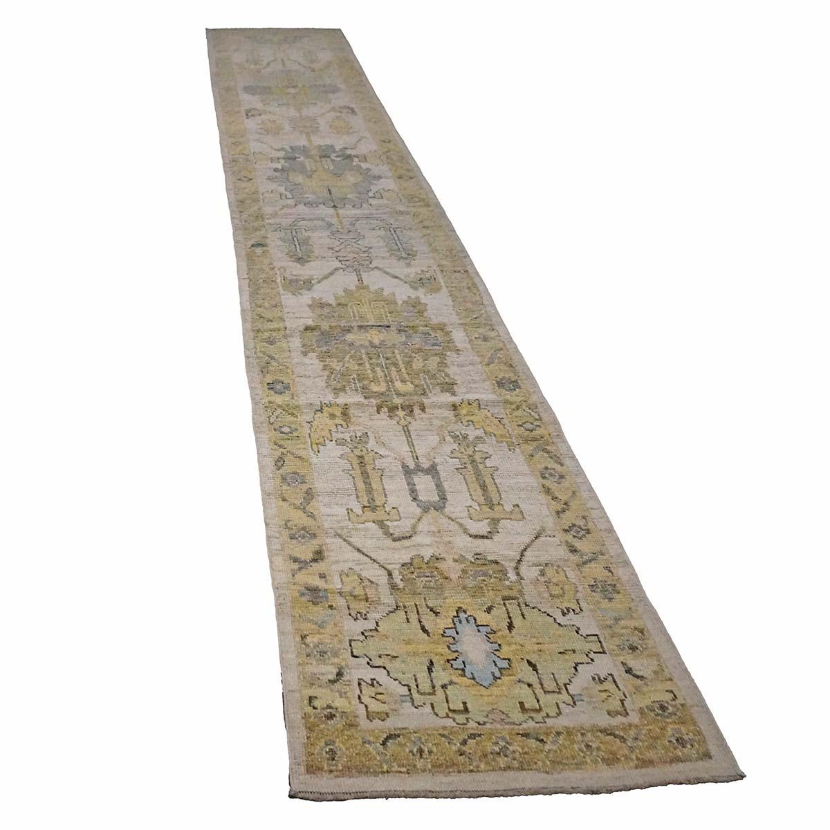  Ashly Fine Rugs presents a 21st-century Turkish Oushak 3X18 Handmade Area Rug. Oushak weavings began in a location just south of Istanbul, in a region that was to become the rugs namesake, Oushak. Although nomads first produced the rugs for