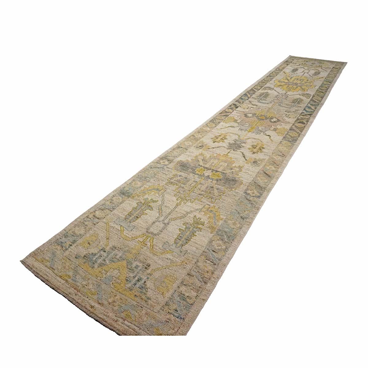   Ashly Fine Rugs presents a 21st-century Turkish Oushak 3X18 Handmade Area Rug. Oushak weavings began in a location just south of Istanbul, in a region that was to become the rugs namesake, Oushak. Although nomads first produced the rugs for