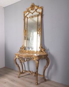 Antique console table in a classic style, made of carved wood and featuring a mirror from the late 19th century