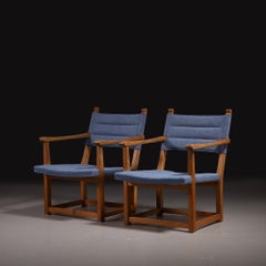 Carl Malmsten Pareja de sillones "Hängsits" de pino macizo, 1947