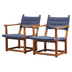 Carl Malmsten Pareja de sillones "Hängsits" de pino macizo, 1947
