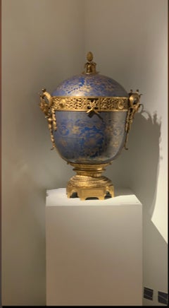 A louis XVI style gilt bronze mounted Chinese blue gilt porcelain pot-pourri