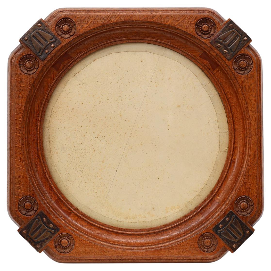 Art nouveau oak photo frame with copper decorations by Geo Verbanck For Sale