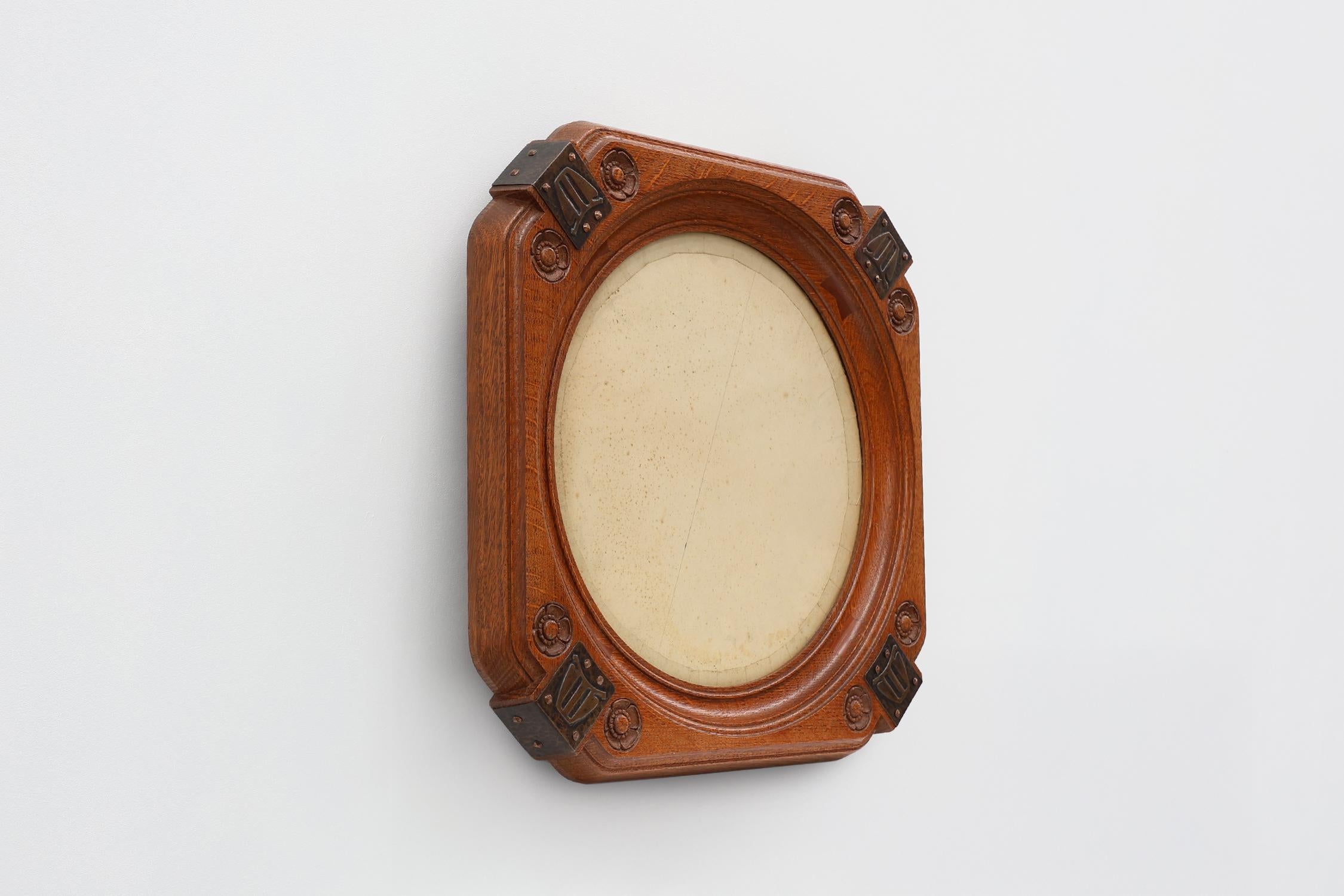Hand-Carved Art nouveau oak photo frame with copper decorations by Geo Verbanck For Sale