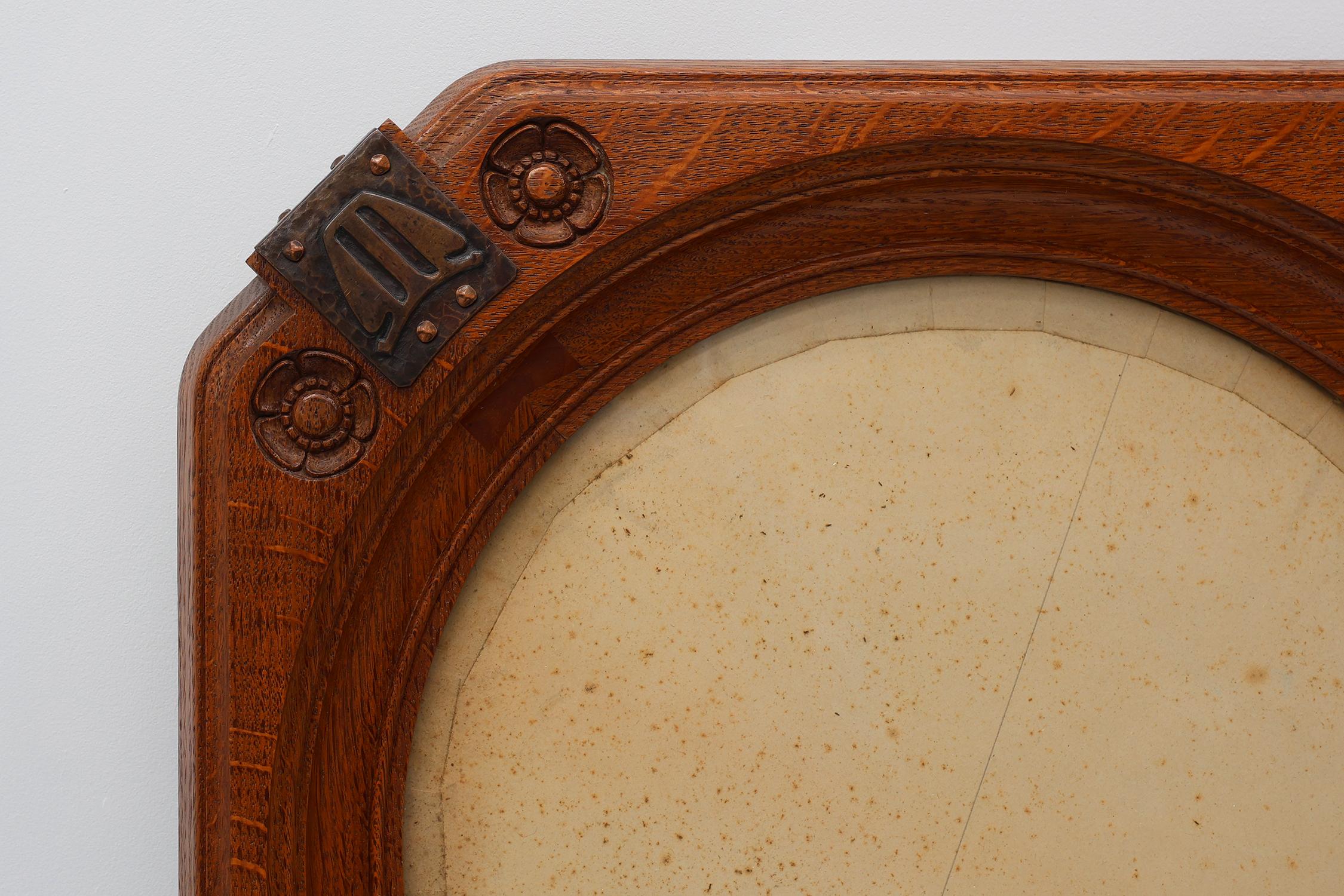 Belgium / 1905 / Photo Frame / Geo Verbanck / oak, copper / Art Deco / Art Nouveau

Photo frame in Art Nouveau style with copper decorations by the Belgium artist Geo Verbanck. This frame was hand crafted in caramel colored oak wood. Four corners