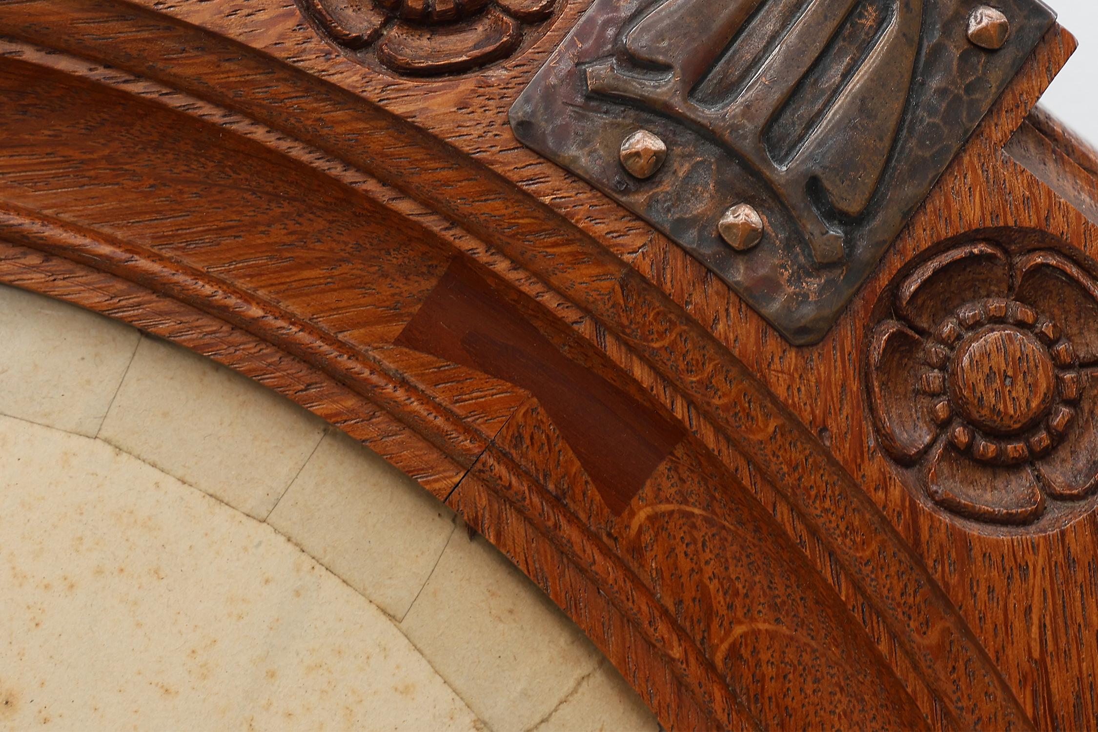 Early 20th Century Art nouveau oak photo frame with copper decorations by Geo Verbanck For Sale