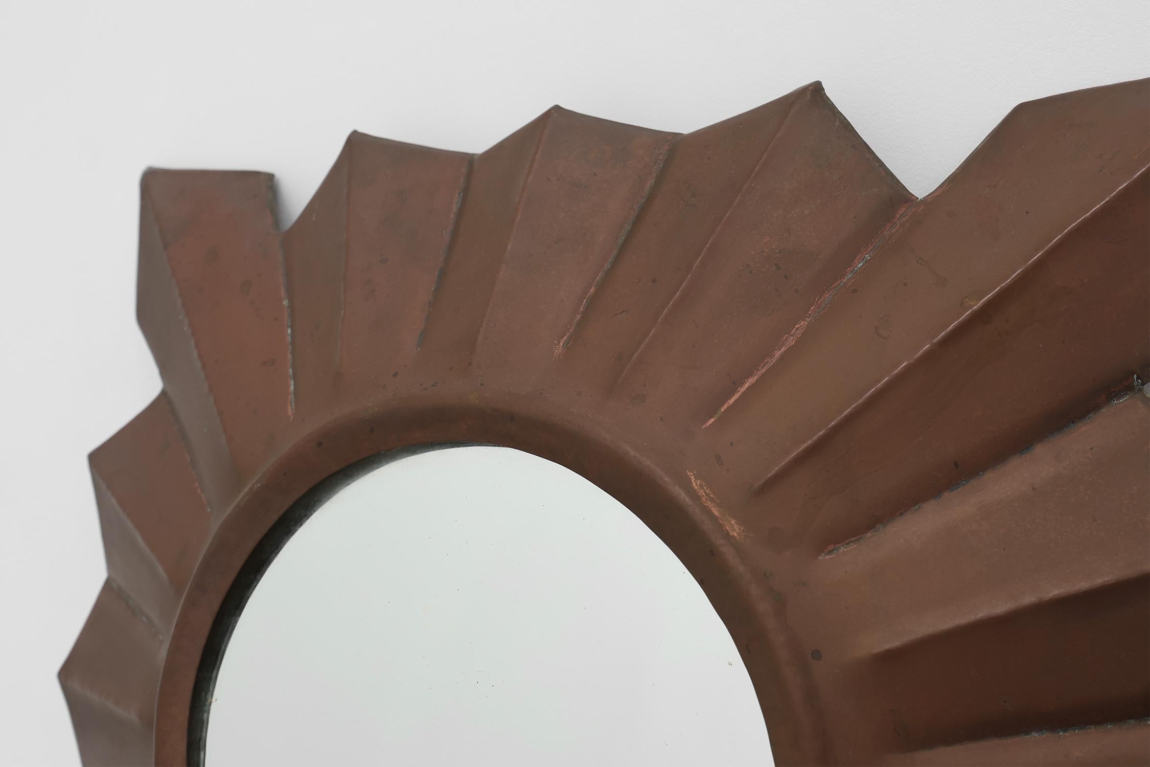 Early 20th Century Art Deco sunburst mirror in red copper, France 1920s For Sale