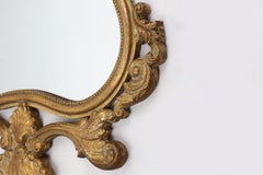 20th Century Belgian baroque mirror in gilded wood
