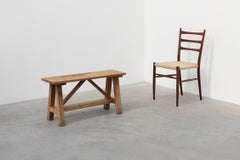 Rustic oak trestle bench, France, ca. 1900