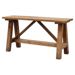 Rustic oak trestle bench, France, ca. 1900