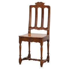 Antique carved oak side chair, France 18th century