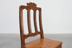 Antique carved oak side chair, France 18th century