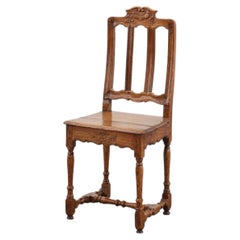 Antique carved oak side chair, France 18th century