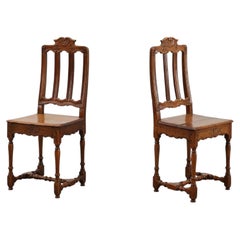 Pair of Antique carved oak side chairs, France 18th century