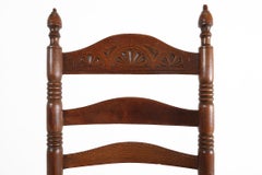 Antique wooden armchair with cane seat, France ca. 1900