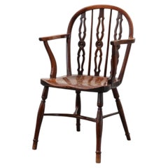 English Windsor armchair with oak seat and spindle back, 19th century