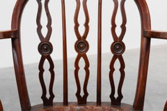 English Windsor armchair with oak seat and spindle back, 19th century