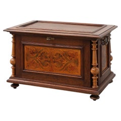 Neo-Renaissance walnut chest with inlaid front panel and turned columns, Belgium
