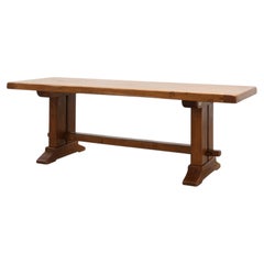 Solid oak trestle table with pegged stretcher, France, 20th century