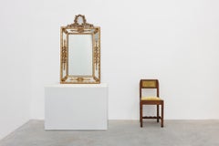 Louis XVI style gilt mirror with laurel wreath crest, Belgium, 20th century