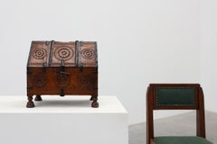 18th Century Carved Wooden Coffer with Slanted Lid and Iron Mounts, France